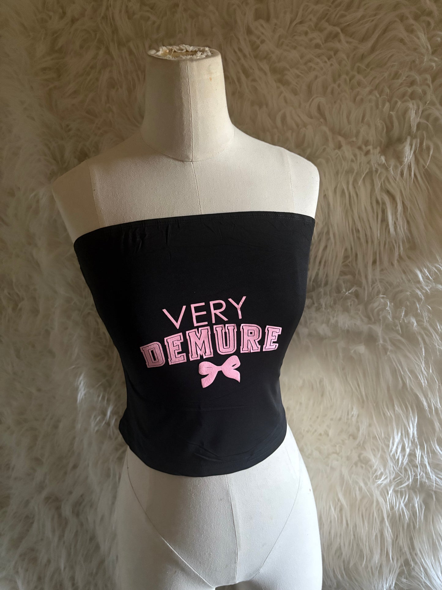 Demure Top - Black Strapless with "VERY DEMURE" Pink Text and Bow Design