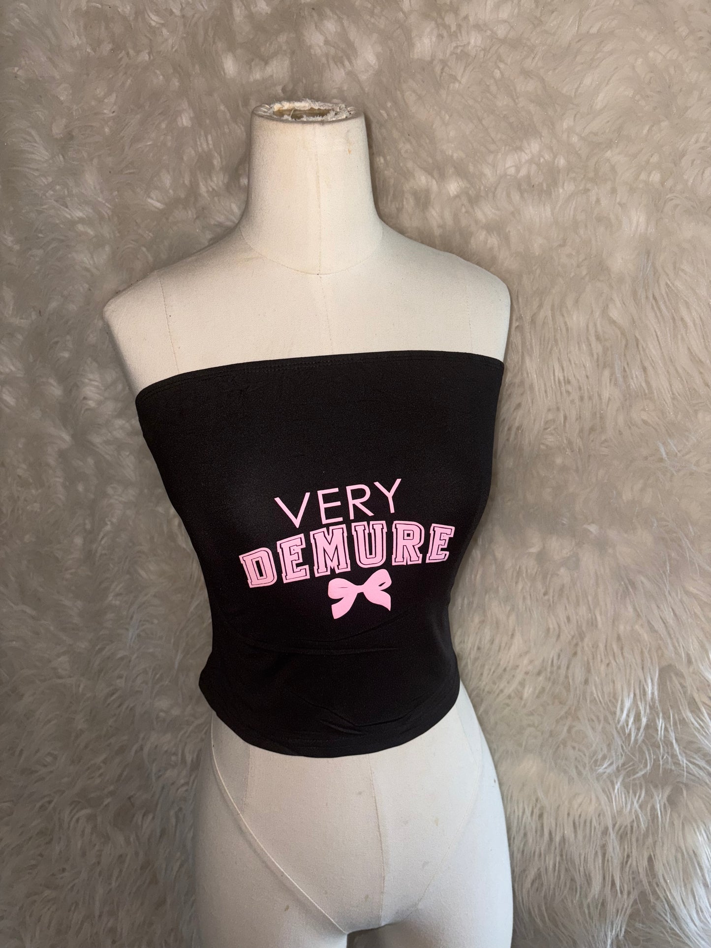 Demure Top - Black Strapless with "VERY DEMURE" Pink Text and Bow Design