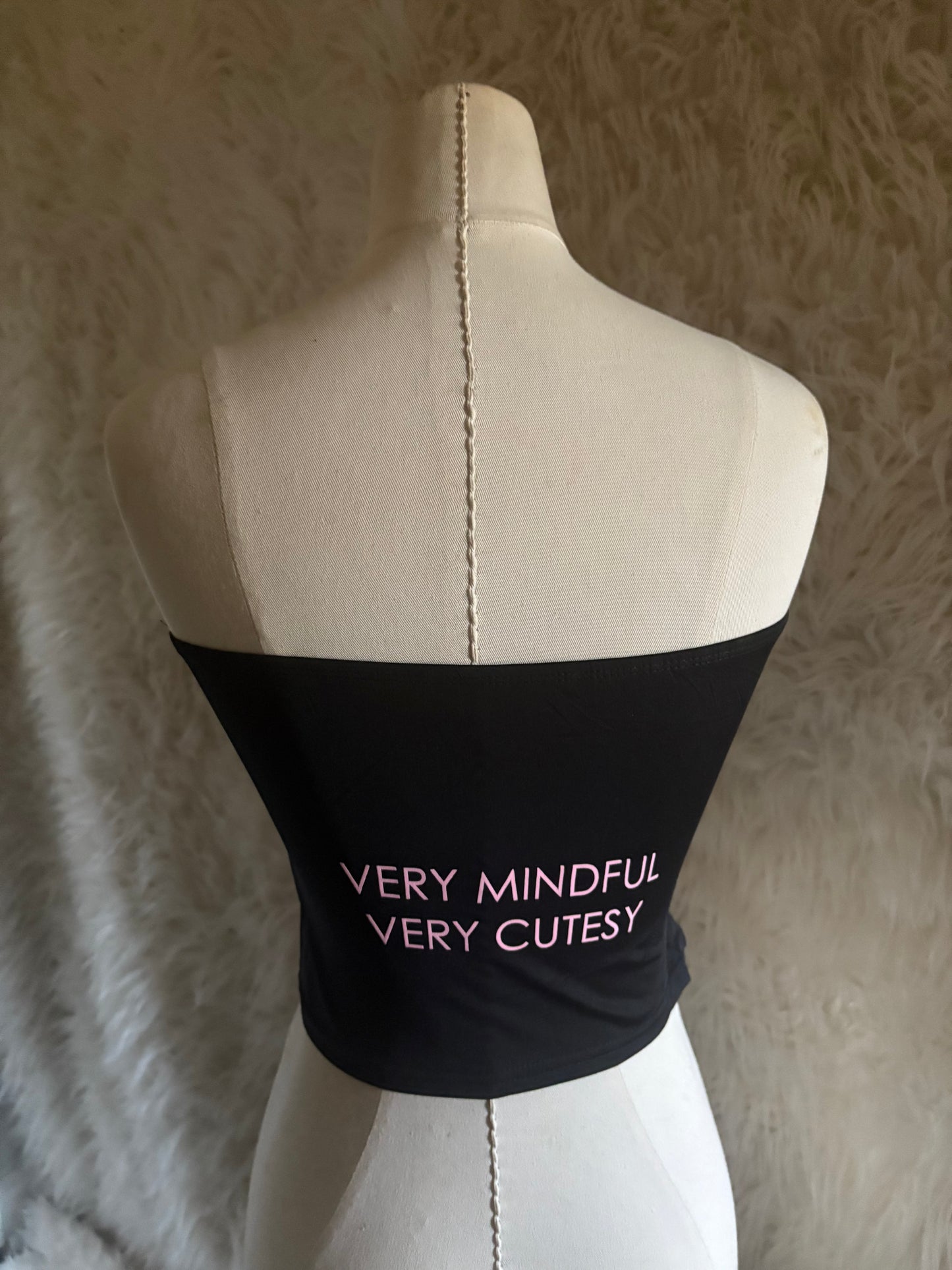 Demure Top - Black Strapless with "VERY DEMURE" Pink Text and Bow Design