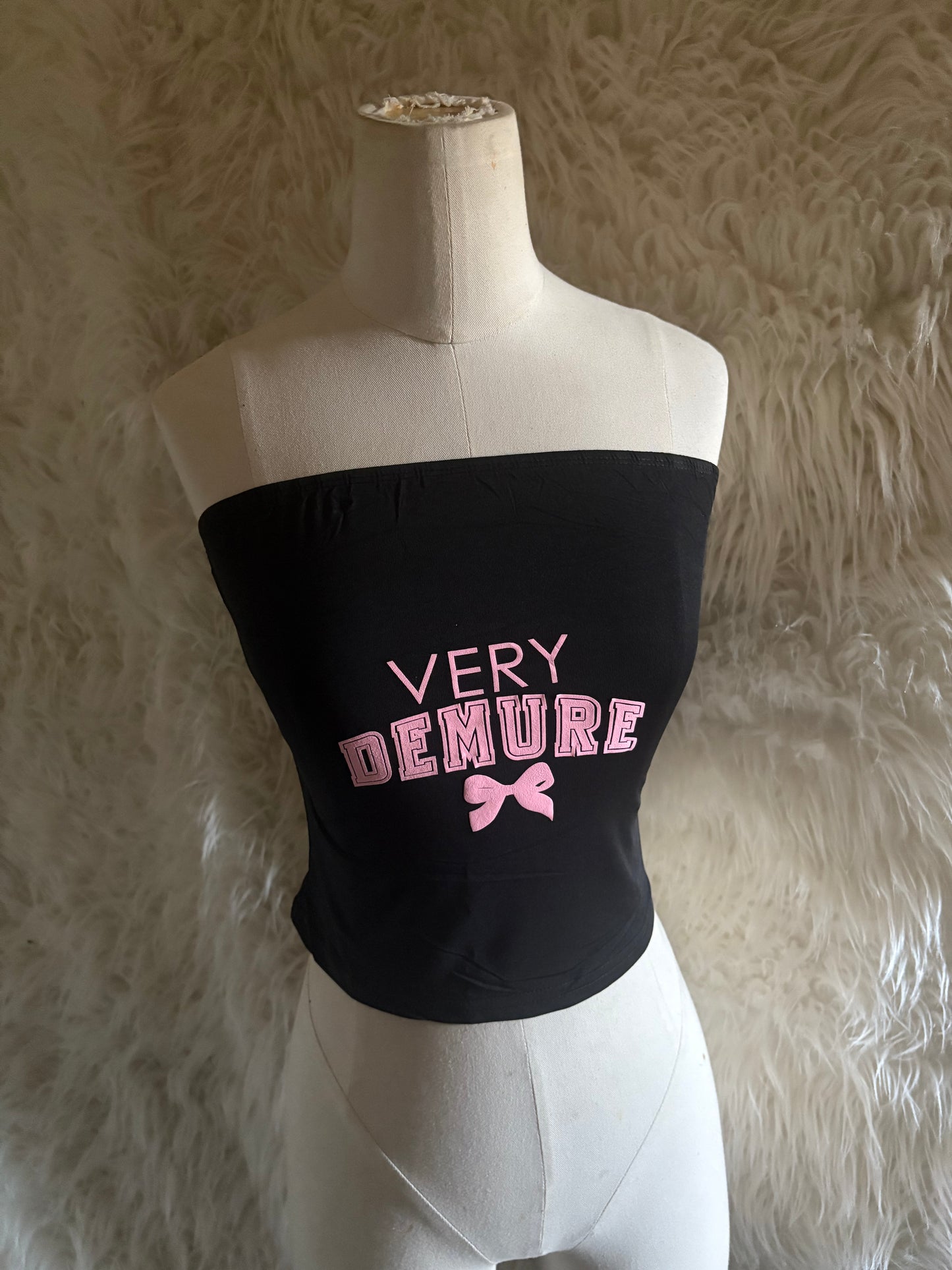 Demure Top - Black Strapless with "VERY DEMURE" Pink Text and Bow Design