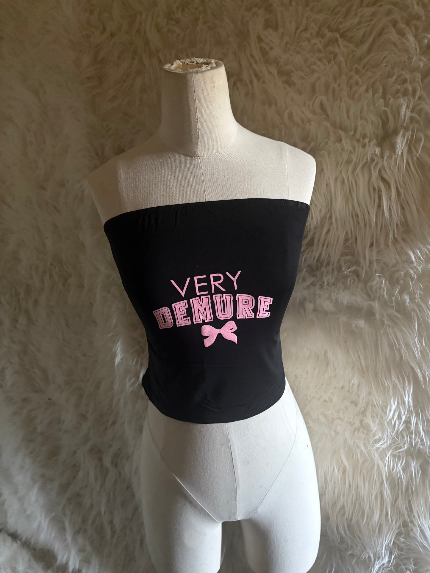 Demure Top - Black Strapless with "VERY DEMURE" Pink Text and Bow Design